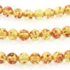 6mm Round Yellow/Honey Copal Amber. 