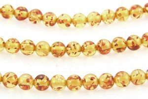 6mm Round Yellow/Honey Copal Amber. 