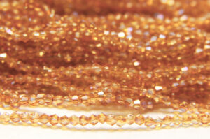 2mm Deep Champagne AB Crystal Bicones