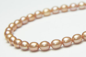 6-8mm Apricot Champagne Rice Freshwater Pearls