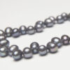 5.5-6mm Grey Peacock Top Drilled Rice Freshwater Pearls