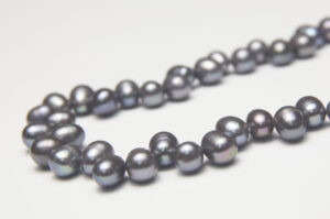 5.5-6mm Grey Peacock Top Drilled Rice Freshwater Pearls