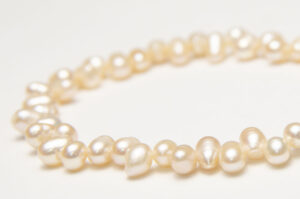5-6mm Natural Apricot Top Drilled Rice Freshwater Pearls