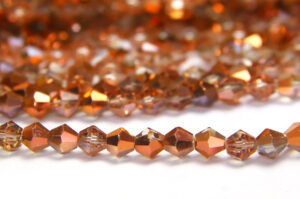 6mm Demi Coated Rose Gold Crystal Bicones