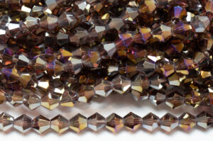 6mm Old Gold Fumed Purple Crystal Bicones