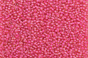 Magenta Lined Amber  Preciosa Seed Beads